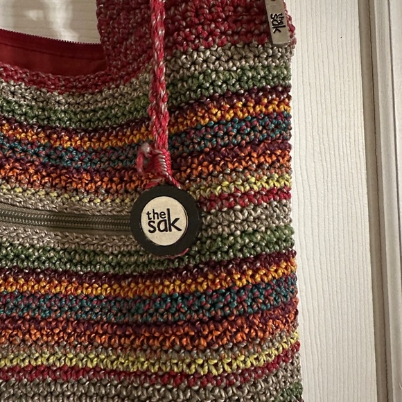 The Sak multi colored crotchet purse. Red interior in good condition. Preowned - Picture 3 of 7